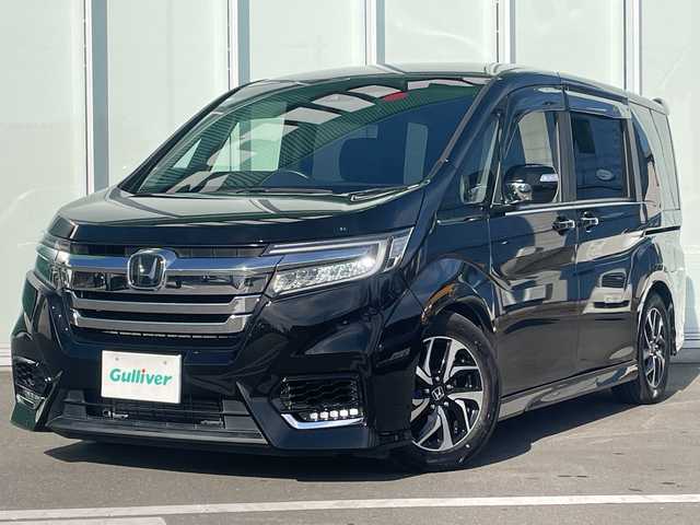 ホンダ ステップワゴン スパーダ ホンダセンシング 神奈川県 2018(平30)年 4万km プレミアムスパークルブラックパール 純正HDDナビ（AV-RQ912）/Bluetooth/フルセグ/iPod/AUX/USB/CD/DVD/両側パワースライドドア/追従式クルーズコントロール/バックカメラ/ドライブレコーダー/デジタルミラー/プッシュスタート/スマートキー/パドルシフト/LEDヘッドライト/フォグランプ/純正アルミホイール/純正フロアマット/電動格納ミラー/ドアバイザー/横滑り防止装置/レーンキープアシスト/衝突被害軽減システム