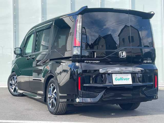 ホンダ ステップワゴン スパーダ ホンダセンシング 神奈川県 2018(平30)年 4万km プレミアムスパークルブラックパール 純正HDDナビ（AV-RQ912）/Bluetooth/フルセグ/iPod/AUX/USB/CD/DVD/両側パワースライドドア/追従式クルーズコントロール/バックカメラ/ドライブレコーダー/デジタルミラー/プッシュスタート/スマートキー/パドルシフト/LEDヘッドライト/フォグランプ/純正アルミホイール/純正フロアマット/電動格納ミラー/ドアバイザー/横滑り防止装置/レーンキープアシスト/衝突被害軽減システム