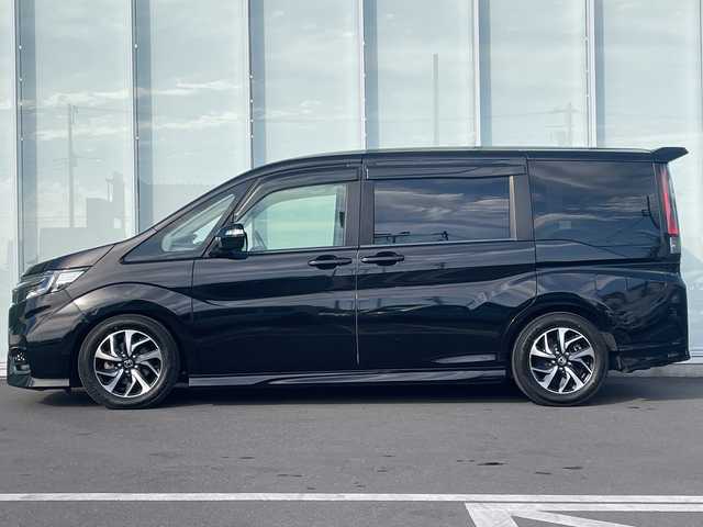 ホンダ ステップワゴン スパーダ ホンダセンシング 神奈川県 2018(平30)年 4万km プレミアムスパークルブラックパール 純正HDDナビ（AV-RQ912）/Bluetooth/フルセグ/iPod/AUX/USB/CD/DVD/両側パワースライドドア/追従式クルーズコントロール/バックカメラ/ドライブレコーダー/デジタルミラー/プッシュスタート/スマートキー/パドルシフト/LEDヘッドライト/フォグランプ/純正アルミホイール/純正フロアマット/電動格納ミラー/ドアバイザー/横滑り防止装置/レーンキープアシスト/衝突被害軽減システム