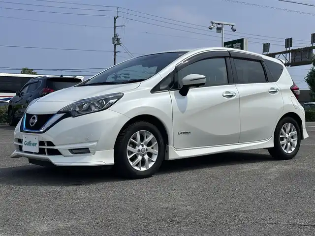 日産 ノート e－パワー X 徳島県 2018(平30)年 8.2万km ブリリアントホワイトパール 純正7型SDナビ　MM517D-W/（ラジオ/HDMI/フルセグ/AUX/BT/Blu-ray）/バックカメラ/アラウンドビューモニター/オプションスポイラー/追従式クルーズコントロール/LEDヘッドライト/オートライト/デジタルインナーミラー/フロント/サイドカメラ/ドライブレコーダー/ETC/ステアリングスイッチ/ウィンカーミラー/純正15AW/スペアキー/ドアバイザー