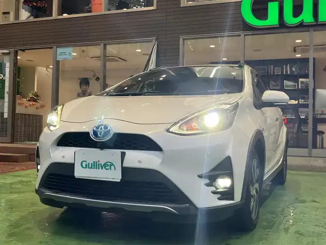 トヨタ アクア クロスオーバー グラム 神奈川県 2019(令1)年 4.5万km ホワイトパールクリスタルシャイン 純正9型ナビ/Bluetooth/CD/DVD/アラウンドビューカメラ/フルセグ/衝突被害軽減ブレーキ/車線逸脱抑制装置/オートマチックハイビーム/クリアランスソナー/ETC/ドラレコ/ハーフレザーシート/純正16インチAW/LEDヘッドライト/スマートキー2個