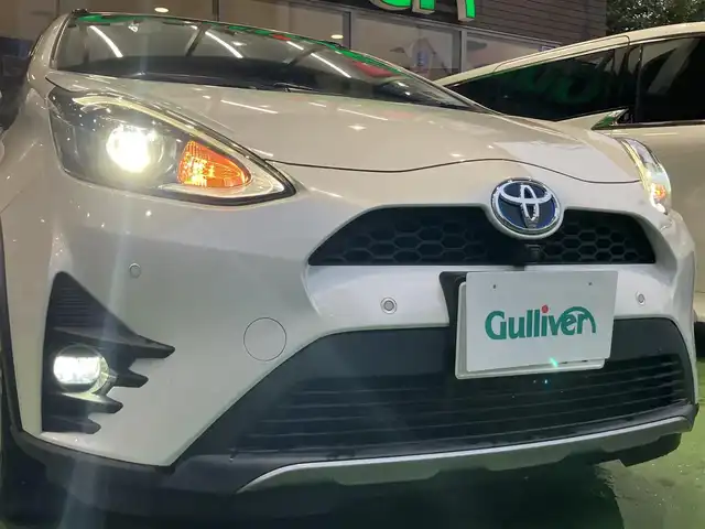 トヨタ アクア クロスオーバー グラム 神奈川県 2019(令1)年 4.5万km ホワイトパールクリスタルシャイン 純正9型ナビ/Bluetooth/CD/DVD/アラウンドビューカメラ/フルセグ/衝突被害軽減ブレーキ/車線逸脱抑制装置/オートマチックハイビーム/クリアランスソナー/ETC/ドラレコ/ハーフレザーシート/純正16インチAW/LEDヘッドライト/スマートキー2個