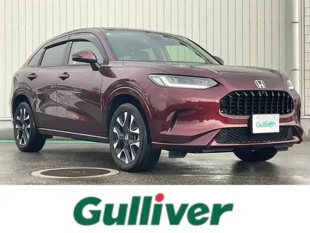 ホンダ ＺＲ－Ｖ ハイブリッド e:HEV Z 富山県 2023(令5)年 3.4万km ワイン 色番号R５７８M(プレミアムクリスタルガーネットメタリック)/ホンダセンシング/レーダークルーズコントロール/レーンキープアシスト/衝突軽減ブレーキ/オートマチックハイビーム/BOSEプレミアムサウンド/マルチビューカメラシステム/メーカーナビ/フルセグＴＶ/Bluetooth/10.2インチグラフィックメーター/置くだけ充電/革シート/シートヒーター/パワーシート/ステアリングヒーター/ドライブレコーダー/ビルトインETC/パワーバックドア/LEDオートライト