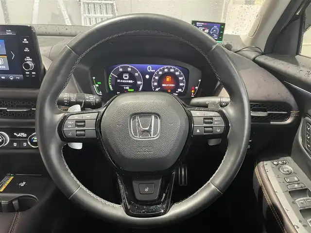 ホンダ ＺＲ－Ｖ ハイブリッド e:HEV Z 富山県 2023(令5)年 3.4万km ワイン 色番号R５７８M(プレミアムクリスタルガーネットメタリック)/ホンダセンシング/レーダークルーズコントロール/レーンキープアシスト/衝突軽減ブレーキ/オートマチックハイビーム/BOSEプレミアムサウンド/マルチビューカメラシステム/メーカーナビ/フルセグＴＶ/Bluetooth/10.2インチグラフィックメーター/置くだけ充電/革シート/シートヒーター/パワーシート/ステアリングヒーター/ドライブレコーダー/ビルトインETC/パワーバックドア/LEDオートライト