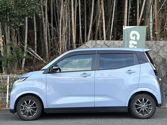 日産 サクラ G 京都府 2023(令5)年 2万km ライトブルー 純正ナビ/・フルセグTV/BT Audio/バック/サイド/フロントカメラ/アラウンドビューモニター/レーダークルーズコントロール/プロパイロット/ETC/前後ドライブレコーダー/エマージェンシーブレーキ/パーキングアシスト/デジタルインナーミラー/e-pedal/コーナーセンサー/シートヒーター/ステアリングヒーター/ステアリングスイッチ/電動パーキングブレーキ/ブレーキホールド/プッシュスタート/純正ドアバイザー/純正フロアマット/純正サマータイヤ4本車載/充電コード/保証書＆取説/ナビ取説/スマートキースペア