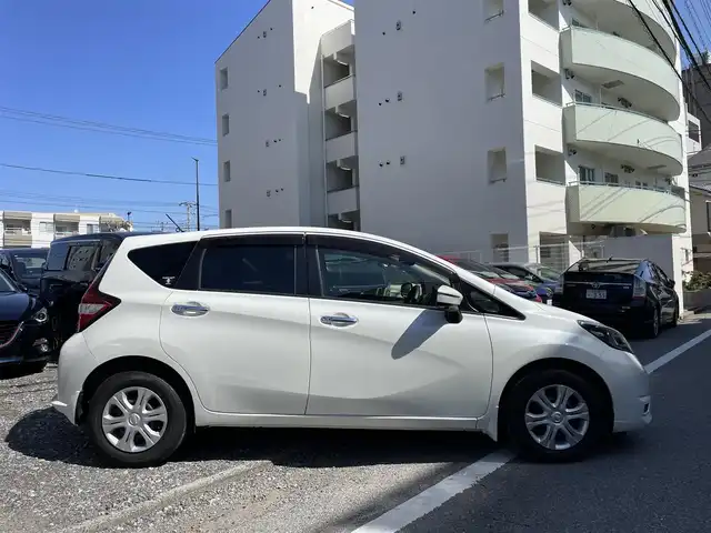 日産 ノート X 東京都 2019(令1)年 1.7万km ブリリアントホワイトパール 登録時走行距離16358km/純正メモリナビ/（DVD/フルセグTV/Bluetooth/MSV）/全周囲カメラ/前方ドライブレコーダー（ナビ連動）/ETC/エマージェンシーブレーキアシスト/レーンキープアシスト/横滑り防止機能/ステアリングスイッチ/純正LEDヘッドライト/オートライト/スマートキー/スペアキー1本/保証書/取扱説明書