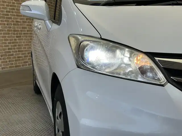 ホンダ フリード G ジャストセレクション+ 岩手県 2014(平26)年 9.7万km ホワイトオーキッドパール 純正フロアマット/純正エンジンスターター/ダウンヒルアシスト/オートライト/バックカメラ/ウォークスルー/2列目外側アームレスト/フルオートエアコン/Ｗエアバック/左側パワースライドドア/セキュリティーアラーム/サマータイヤ積み込み