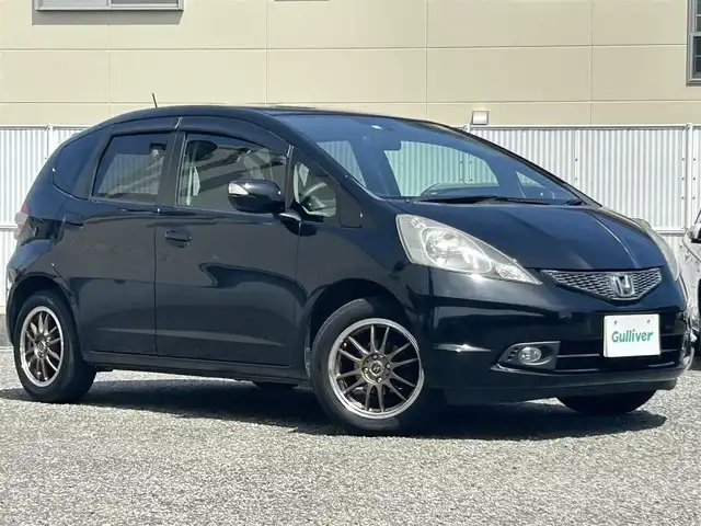 ホンダ フィット G 大阪府 2010(平22)年 7.7万km クリスタルブラックパール SDナビ（NX710)/・フルセグテレビ/・DVD/CD/・USB入力端子/横滑り防止措置/純正キセノンライト/フロントフォグランプ/社外AW（BADX/15inch)/リモコンキー/スペアキー一本/取扱説明書/保証書