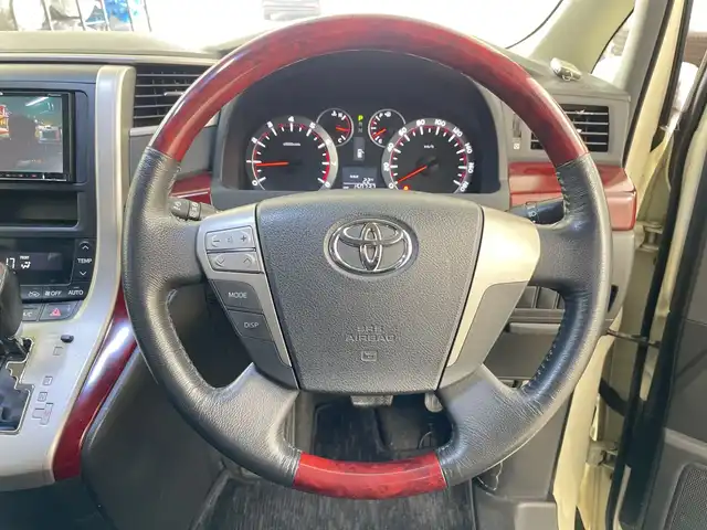 トヨタ アルファード 240S 道央・札幌 2008(平20)年 15.1万km ゴールドパールクリスタルシャイン ・4WD/・社外ナビ (AVIC-MRZ09) /・フルセグTV/BT/DVD/SD/・バックカメラ/・両側パワースライドドア/・コーナーセンサー/・横滑り防止/盗難防止/・オートライト/HIDライト/・ETC/・2列目オットマン/・電動格納ミラー/・シートカバー付