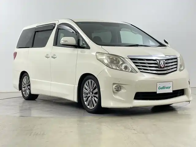 トヨタ アルファード 240S 道央・札幌 2008(平20)年 15.1万km ゴールドパールクリスタルシャイン ・4WD/・社外ナビ (AVIC-MRZ09) /・フルセグTV/BT/DVD/SD/・バックカメラ/・両側パワースライドドア/・コーナーセンサー/・横滑り防止/盗難防止/・オートライト/HIDライト/・ETC/・2列目オットマン/・電動格納ミラー/・シートカバー付