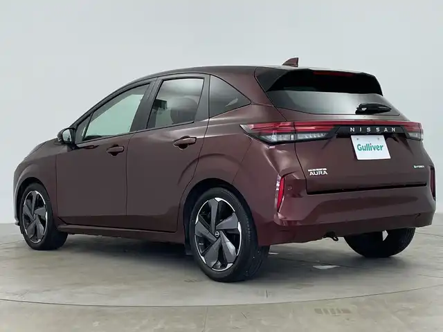 日産 オーラ G レザーエディション 鹿児島県 2022(令4)年 1.8万km バーガンディー 純正ナビ/（BT/フルセグ/HDMI）/プロパイロット/BOSEプレミアムサウンド/アラウンドビューモニター/エマージェンシーブレーキ/デジタルインナーミラー/ワイヤレス充電/オートライト/オートマチックハイビーム/レザーシート/純正フロアマット/スマートキー/プッシュスタート/純正AW17インチ