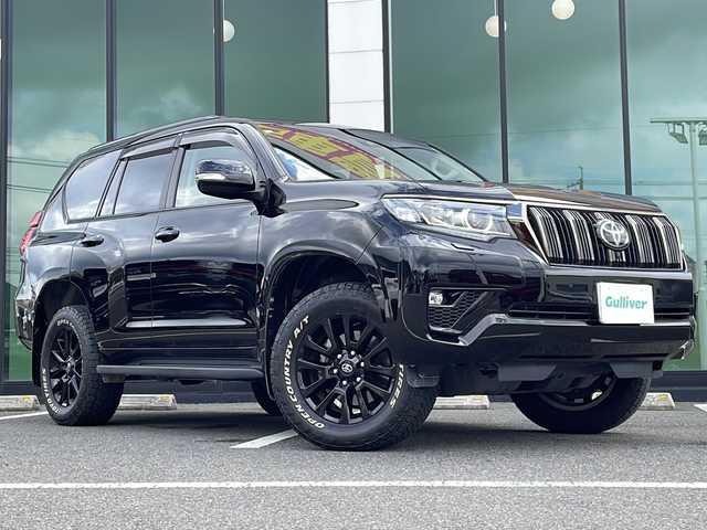 トヨタ ランドクルーザー プラド TX-L 70thアニバーサリーLTD 福岡県 2021(令3)年 6.4万km ブラック ワンオーナー/メーカーオプションナビ/（フルセグTV BT Miracast AM FM)/サンルーフ/BSM/アラウンドビューモニター/ビルトインETC/パワーシート/エアーシート/シートヒーター/純正ドアバイザー/純正フロアマット/純正18インチAW/ドラレコ（COMTEC HDR361GW)/レーダークルーズコントロール/オートライト/ヘッドライトウォッシャー/牽引装置