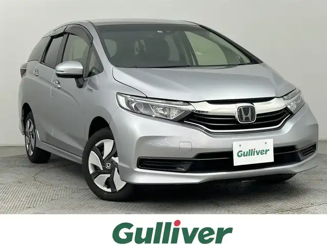 ホンダ シャトル ハイブリッド ホンダセンシング 道央・札幌 2019(令1)年 3.7万km ルナシルバーM ・4WD/・ホンダセンシング/・衝突被害軽減ブレーキ/・レーンキープアシスト/・レーダークルーズコントロール/・先行車発進お知らせ/・標識認識システム/・純正ナビ/・バックカメラ/・Bluetooth/・ビルトインETC/・フロントワイパーデアイサー/・横滑り防止装置/・プッシュスタート/・スマートキー/・電格ミラー/・オートエアコン/・オートライト