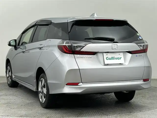 ホンダ シャトル ハイブリッド ホンダセンシング 道央・札幌 2019(令1)年 3.7万km ルナシルバーM ・4WD/・ホンダセンシング/・衝突被害軽減ブレーキ/・レーンキープアシスト/・レーダークルーズコントロール/・先行車発進お知らせ/・標識認識システム/・純正ナビ/・バックカメラ/・Bluetooth/・ビルトインETC/・フロントワイパーデアイサー/・横滑り防止装置/・プッシュスタート/・スマートキー/・電格ミラー/・オートエアコン/・オートライト
