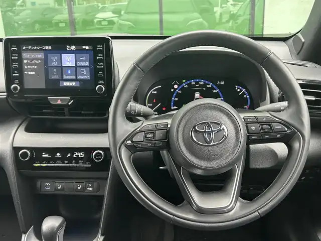 トヨタ ヤリスクロス ハイブリッド Z 香川県 2024(令6)年 1.9万km ブラックマイカ モデリスタエアロ　/ディスプレイオーディオ/全方位カメラ　/トヨタセーフティセンス　/ＢＳＭ　/ＬＴＡ（レーンキープアシスト）/ＰＣＳ（衝突軽減）　/ＲＣＴＡ（リアクロストラフィックアラート）　/ＰＫＳＢ（パーキングサポート）　/ＲＳＡ（ロードサインアシスト）　/前後クリアランスソナー　/革巻きステア／ヒーター　/ビルトインＥＴＣ　/ＬＥＤヘッドライト/オートライト/オートハイビーム機能/Clazzioフロアマット