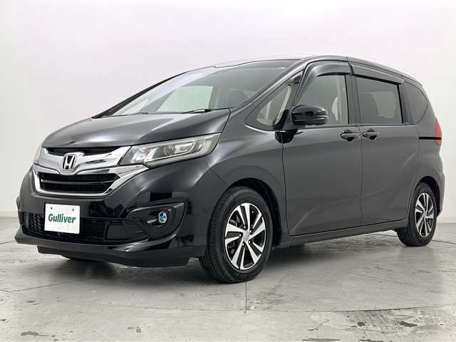 ホンダ フリード G ホンダセンシング 宮城県 2018(平30)年 6.6万km プレミアムスパークルブラックパール 純正ナビ/Ｂｌｕｅｔｏｏｔｈ/フルセグＴＶ/バックカメラ/両側パワースライドドア/衝突軽減ブレーキ（ＣＭＢＳ）/アダプティブクルーズコントロール/レーンキープアシスト/ハーフレザーシート/スペアキー/ビルトインETC/LEDヘッドライト/フォグランプ/アイドリングストップ/ワイパーデアイサー/ロールサンシェード