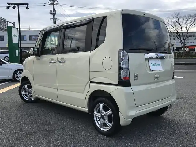 ホンダ Ｎ ＢＯＸ G SSパッケージ 鳥取県 2013(平25)年 10.8万km ヒダマリアイボリーパール ４・W・D/純正CDオーディオ/両側パワースライドドア/横滑り防止装置/プッシュエンジンスタート/アイドリングストップ/ウィンカーミラー/電動格納ミラー/ステアリングスイッチ/社外１４インチアルミ/オートエアコン/フロアマット/ドアバイザー