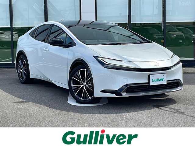 トヨタ プリウス Z 岐阜県 2023(令5)年 1.6万km プラチナホワイトパールマイカ 純正ディスプレイオーディオ/全方位カメラ　/ガラスルーフ　/ビルトインＥＴＣ２．０　/ドライブレコーダー/前後コーナーセンサー　/衝突軽減システム　/パーキングアシスト　/盗難防止装置　/レーンキープアシスト/クルーズコントロール　/レザーシート　/シートヒーター/エアシート/ＬＥＤヘッドライト/オートライト/オートハイビーム　/１００Ｖ電源