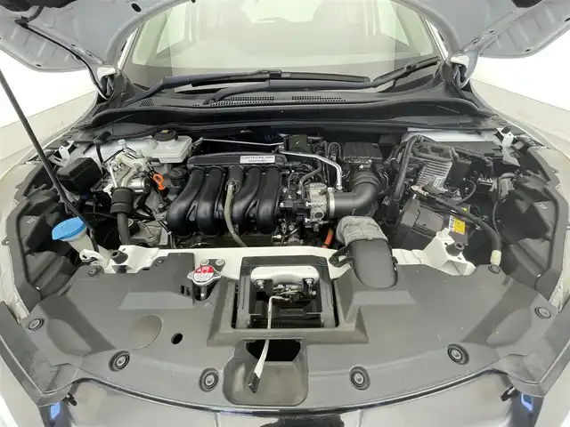 ホンダ ヴェゼル ハイブリッド Z ホンダセンシング 滋賀県 2016(平28)年 6.5万km ホワイトオーキッドパール 禁煙車/純正８インチナビ/・TV・Bluetooth・CD・DVD/バックカメラ/ETC/前方ドライブレコーダー/レーダークルーズコントロール/ステアリングスイッチ/ハーフレザーシート/シートヒーター/ステアリングスイッチ/LEDヘッドライト/オートライト