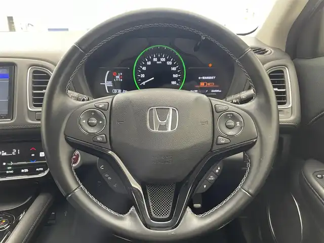 ホンダ ヴェゼル ハイブリッド Z ホンダセンシング 滋賀県 2016(平28)年 6.5万km ホワイトオーキッドパール 禁煙車/純正８インチナビ/・TV・Bluetooth・CD・DVD/バックカメラ/ETC/前方ドライブレコーダー/レーダークルーズコントロール/ステアリングスイッチ/ハーフレザーシート/シートヒーター/ステアリングスイッチ/LEDヘッドライト/オートライト