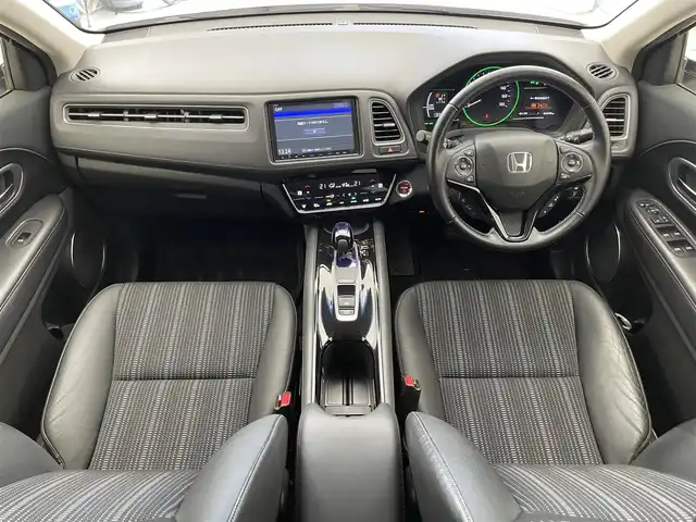 ホンダ ヴェゼル ハイブリッド Z ホンダセンシング 滋賀県 2016(平28)年 6.5万km ホワイトオーキッドパール 禁煙車/純正８インチナビ/・TV・Bluetooth・CD・DVD/バックカメラ/ETC/前方ドライブレコーダー/レーダークルーズコントロール/ステアリングスイッチ/ハーフレザーシート/シートヒーター/ステアリングスイッチ/LEDヘッドライト/オートライト