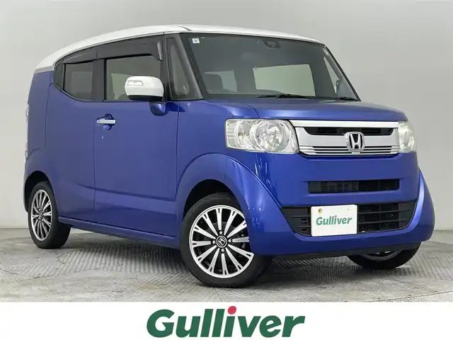 ホンダ Ｎ ＢＯＸ スラッシュ X ターボパッケージ 道央・札幌 2015(平27)年 7.3万km 青Ⅱ ・４WD/・純正メモリナビ/・CD/DVD/BT/フルセグ/SD/AUX/iPod/・ETC/・衝突軽減ブレーキ/・横滑り防止装置/・アイドリングストップ/・CTBA/・前席シートヒーター/・ステアリングヒーター/・モード切替ステアリング/・ワイヤレス充電/・電動パーキングブレーキ/・パドルシフト/・ピタ駐ミラー/・ドアバイザー/・電動格納ウィンカーミラー/・純正フロアマット/・純正15インチAW/・プッシュスタート/・スマートキー/・スペアキー