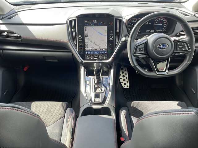 スバル レヴォーグ STIスポーツ EX ブラックインテリアセレ 岩手県 2024(令6)年 1.8万km マグネタイトグレーメタリック ・４WD/・純正メモリナビ（AppleCarplay/AndroidAuto/BT/USB/AUX/AM//FM/フルセグテレビ）/・アイサイトX/・渋滞時ハンズオフアシスト/・アクティブレーンチェンジアシスト/・ドライバー異常時対応システム/・カーブ前速度制御/・アラウンドビューモニター/・純正デジタルインナーミラー/・純正ドライブレコーダー前後/・ハーフレザーシート/・純正フロアマット/・パワーシート（運転席・助手席）/・横滑り防止機能/・LEDライト/・コーナーセンサー前後/・パワーバックドア/・パドルシフト/・プリクラッシュブレーキ/・車間距離警報/・エマージェンシーレーンキープアシスト/・車線逸脱防止機能/・後側方警戒支援システム/・ビークルダイナミクスコントロール/・ステアリング連動ヘッドランプ/・アイドリングストップ/・STI専用ステアリング