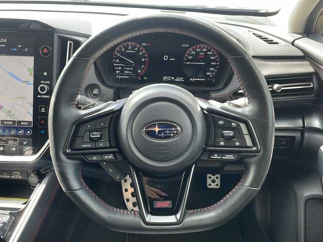 スバル レヴォーグ STIスポーツ EX ブラックインテリアセレ 岩手県 2024(令6)年 1.8万km マグネタイトグレーメタリック ・４WD/・純正メモリナビ（AppleCarplay/AndroidAuto/BT/USB/AUX/AM//FM/フルセグテレビ）/・アイサイトX/・渋滞時ハンズオフアシスト/・アクティブレーンチェンジアシスト/・ドライバー異常時対応システム/・カーブ前速度制御/・アラウンドビューモニター/・純正デジタルインナーミラー/・純正ドライブレコーダー前後/・ハーフレザーシート/・純正フロアマット/・パワーシート（運転席・助手席）/・横滑り防止機能/・LEDライト/・コーナーセンサー前後/・パワーバックドア/・パドルシフト/・プリクラッシュブレーキ/・車間距離警報/・エマージェンシーレーンキープアシスト/・車線逸脱防止機能/・後側方警戒支援システム/・ビークルダイナミクスコントロール/・ステアリング連動ヘッドランプ/・アイドリングストップ/・STI専用ステアリング