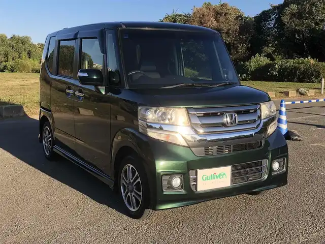ホンダ Ｎ ＢＯＸ カスタム G Lパッケージ 福岡県 2016(平28)年 12.5万km ブリティッシュグリーンP シティブレーキアクティブシステム/ワンオーナー/純正インターナビ【VXM-175VFi】/　フルセグTV/CD/DVD/Bluetooth/バックカメラ/アイドリングストップ/ウィンカーミラー/ドアバイザー/純正フロアマット/プッシュスタート/片側パワースライドドア/ETC/HIDヘッドライト/純正14インチアルミホイール/保証書/取扱説明書