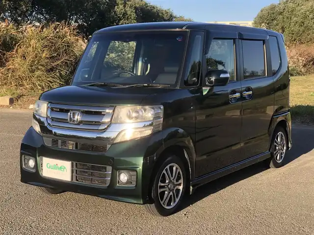ホンダ Ｎ ＢＯＸ カスタム G Lパッケージ 福岡県 2016(平28)年 12.5万km ブリティッシュグリーンP シティブレーキアクティブシステム/ワンオーナー/純正インターナビ【VXM-175VFi】/　フルセグTV/CD/DVD/Bluetooth/バックカメラ/アイドリングストップ/ウィンカーミラー/ドアバイザー/純正フロアマット/プッシュスタート/片側パワースライドドア/ETC/HIDヘッドライト/純正14インチアルミホイール/保証書/取扱説明書