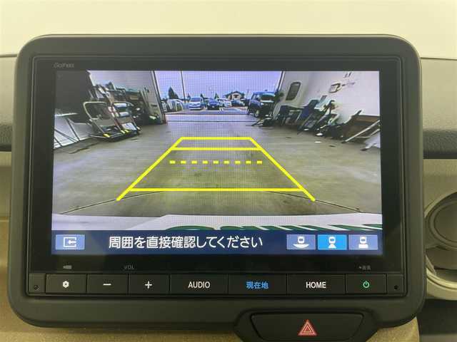 ホンダ Ｎ ＢＯＸ 富山県 2025(令7)年 0.2万km プラチナホワイトパール 純正8型ナビ（AM/FM/BT/USB/フルセグ）/バックカメラ/ETC/片側パワースライドドア/シートヒーター/衝突被害軽減システム/レーダークルーズコントロール/レーンキープアシスト/コーナーセンサー/横滑り防止装置/オートLEDライト/純正フロアマット/オートホールド付電子パーキング/ステアリングスイッチ/スマートキー/スペアキー