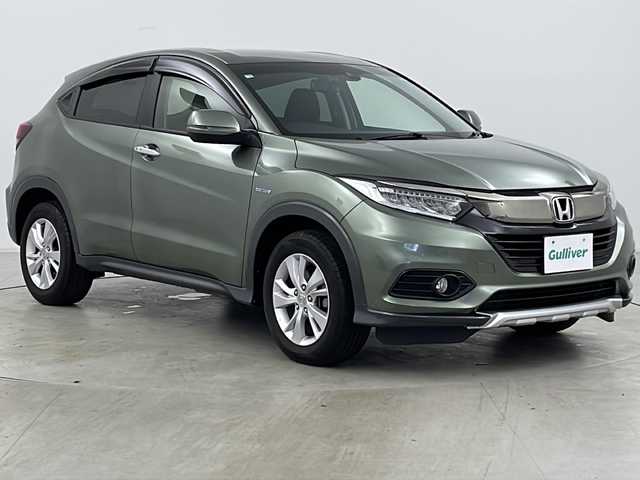 ホンダ ヴェゼル ハイブリッド X ホンダセンシング 道央・札幌 2020(令2)年 3.4万km シルバーミストグリーンM ・４WD/・寒冷地仕様/・純正ナビ（CD/DVD/BT/フルセグTV）/・バックカメラ/・ホンダセンシング/・前席シートヒーター/・レーダークルーズコントロール/・パドルシフト/・ビルトインETC/・ミラーヒーター /・前後ドライブレコーダー/・フロントワイパーデアイサー/・LEDヘッドライト/・フォグランプ/・スマートキー/・プッシュスタート/・横滑り防止