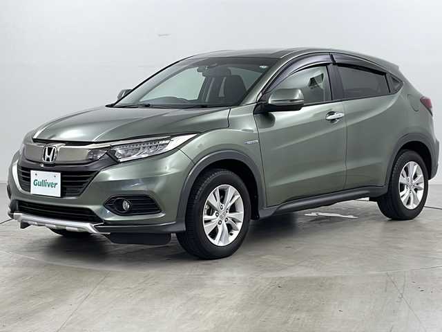 ホンダ ヴェゼル ハイブリッド X ホンダセンシング 道央・札幌 2020(令2)年 3.4万km シルバーミストグリーンM ・４WD/・寒冷地仕様/・純正ナビ（CD/DVD/BT/フルセグTV）/・バックカメラ/・ホンダセンシング/・前席シートヒーター/・レーダークルーズコントロール/・パドルシフト/・ビルトインETC/・ミラーヒーター /・前後ドライブレコーダー/・フロントワイパーデアイサー/・LEDヘッドライト/・フォグランプ/・スマートキー/・プッシュスタート/・横滑り防止