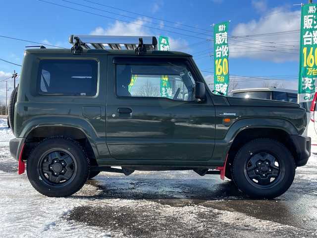 スズキ ジムニー XG 道央・札幌 2019(平31)年 15.3万km ジャングルグリーン ４WD/純正SDナビ/AM/FM/BT/SD/CD/DVD/フルセグ/衝突被害軽減ブレーキ/横滑り防止装置/ダウンヒルアシストコントロール/センターデフロック/レーンキープアシスト/バックカメラ/革巻きステアリング/リモコンキー/ハロゲンヘッドライト/オートライト/ヘッドライトレベライザー/純正フロアマット/ドアバイザー/ルーフレール/社外AW付夏タイヤ積込/185/85/R16/2023年/山6mm