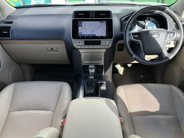 トヨタ ランドクルーザー プラド TX Lパッケージ 奈良県 2020(令2)年 2.4万km ホワイトパールクリスタルシャイン 純正９インチナビ（NSZT-Y68T）/（フルセグ／ＢＴ／ＣＤ／ＤＶＤ）/ベージュレザーシート/レーダークルーズコントロール/バックカメラ/プリクラッシュセーフティ/レーンキープアシスト/前席パワーシート/前席シートヒーター/エアーシート/LEDヘッドライト/ヘッドライトウォッシャー/ETC/純正17インチAW/保証書/取り扱い説明書/スペアキーX１