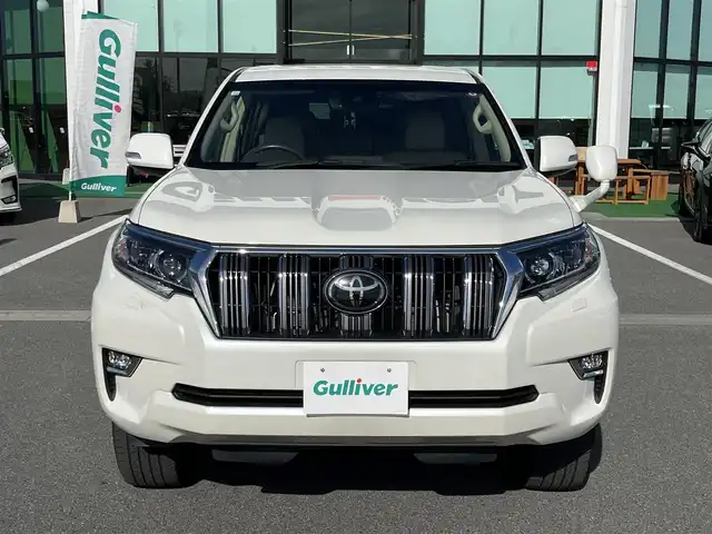 トヨタ ランドクルーザー プラド TX Lパッケージ 奈良県 2020(令2)年 2.4万km ホワイトパールクリスタルシャイン 純正９インチナビ（NSZT-Y68T）/（フルセグ／ＢＴ／ＣＤ／ＤＶＤ）/ベージュレザーシート/レーダークルーズコントロール/バックカメラ/プリクラッシュセーフティ/レーンキープアシスト/前席パワーシート/前席シートヒーター/エアーシート/LEDヘッドライト/ヘッドライトウォッシャー/ETC/純正17インチAW/保証書/取り扱い説明書/スペアキーX１