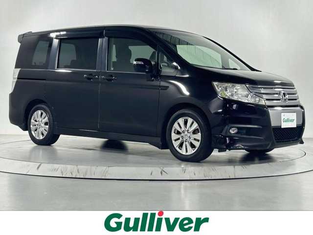 ホンダ ステップワゴン スパーダ Z 佐賀県 2010(平22)年 14.7万km プレミアムブラキッシュパール 純正7インチナビ/CD/DVD/MSV/バックカメラ /ビルトインETC/両側パワースライドドア/パドルシフト/純正16インチアルミホイール/純正フロアマット/HIDライト/フォグライト /オートライト/スマートキー/スペアキー