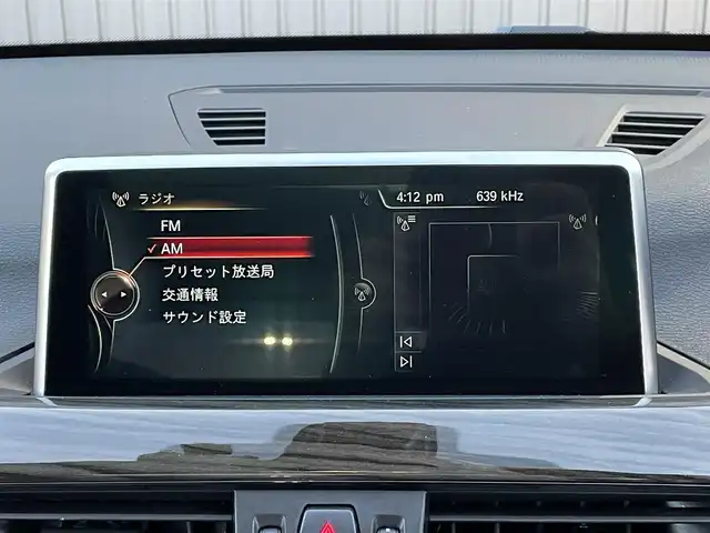 ＢＭＷ Ｘ１ xDrive 20i Xライン 青森県 2016(平28)年 5.5万km 茶 純正HDDナビ/(CD/DVD/Bluetooth/AM/FM)/USB入力端子/バックカメラ/電動パノラマサンルーフ/ドライビングアシスト/・車線逸脱警報システム/・衝突回避/・衝突軽減ブレーキ/パーキングアシスト/クルーズコントロール/LEDヘッドライト/オートライト/レザーシート/シートヒーター/パークディスタンスコントロール/純正19インチAW/オートマチックデールゲート/ドライブレコーダー/ミラー一体型ETC/ルーフレール/スマートキー/スペアキー/純正フロアマット/チェスナットブロンズカラー(C29)