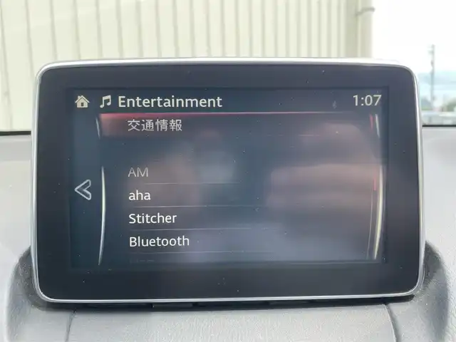 マツダ デミオ 富山県 2015(平27)年 7.4万km グレー ４ＷＤ／/マツダコネクトナビ／/フルセグＴＶ／/Ｂｌｕｅｔｏｏｔｈ／/ＤＶＤ再生／/ビルトインＥＴＣ／/クルーズコントロール／/ブラインドスポットモニター／/ヘッドアップディスプレイ／/衝突軽減ブレーキ／/ＬＥＤオートライト/ＬＥＤフォグライト