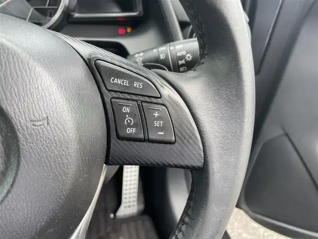 マツダ デミオ 富山県 2015(平27)年 7.4万km グレー ４ＷＤ／/マツダコネクトナビ／/フルセグＴＶ／/Ｂｌｕｅｔｏｏｔｈ／/ＤＶＤ再生／/ビルトインＥＴＣ／/クルーズコントロール／/ブラインドスポットモニター／/ヘッドアップディスプレイ／/衝突軽減ブレーキ／/ＬＥＤオートライト/ＬＥＤフォグライト