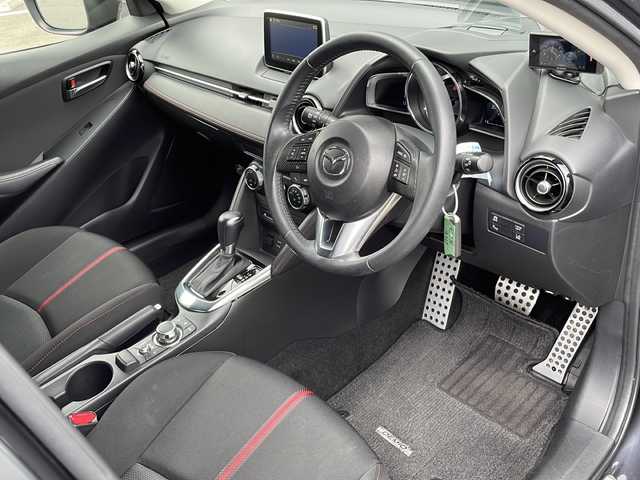 マツダ デミオ XD ツーリング 道東・釧路十勝 2015(平27)年 7.4万km メテオグレーマイカ ・４ＷＤ/・マツダコネクトナビ/(CD/DVD.BT.FM/AM.USB.AUX)/・社外レーダー/・横滑り防止/・ビルトインETC/・クルーズコントロール/・ブラインドスポットモニター/・ヘッドアップディスプレイ/・衝突軽減ブレーキ/・LEDヘッドライト/・フォグライト/・スマートキー