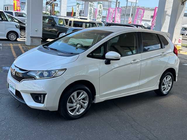 ホンダ フィット 13G Sパッケージ 道東・釧路十勝 2016(平28)年 7.4万km プレミアムホワイトパールⅡ ４WD/純正インターナビ(VXM-165VFi）/CD/DVD/BT/MSV/フルセグTV/バックカメラ /純正エンジンスターター/純正ドライブレコーダー/ETC/衝突軽減ブレーキ( CTBA)/LEDヘッドライト/カーテンエアバック/スペアキー有り