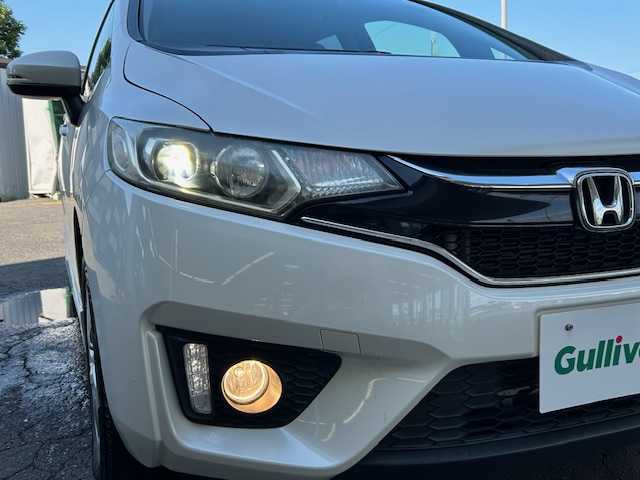ホンダ フィット 13G Sパッケージ 道東・釧路十勝 2016(平28)年 7.4万km プレミアムホワイトパールⅡ ４WD/純正インターナビ(VXM-165VFi）/CD/DVD/BT/MSV/フルセグTV/バックカメラ /純正エンジンスターター/純正ドライブレコーダー/ETC/衝突軽減ブレーキ( CTBA)/LEDヘッドライト/カーテンエアバック/スペアキー有り