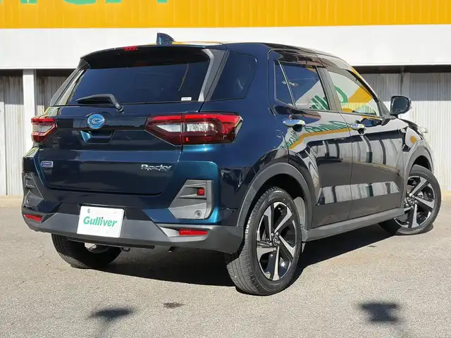 ダイハツ ロッキー プレミアム G HEV 三重県 2021(令3)年 2.6万km レーザーブルークリスタルシャイン 走行距離25540ｋｍ/スマートアシスト/　・衝突警報機能（対車両・対歩行者）/　・衝突回避支援ブレーキ機能（対車両・対歩行者）/　・ブレーキ制御付誤発進抑制機能（前方・後方）/　・車線逸脱警報機能/　・車線逸脱抑制制御機能/　・路側逸脱警報機能/　・全車速追従機能付ＡＣＣ/純正９型ナビ/　・Bluetooth/　・フルセグＴＶ/　・ＤＶＤ再生/　・ＣＤ録音/　・ＵＳＢ/全方位モニター/スマートキーｘ２/プッシュスタート/ドライブレコーダー（ナビ連動）/クリアランスソナー/ハーフレザーシート/前席シートヒーター/革巻きステアリング/ステアリングスイッチ/ＬＥＤヘッドライト/ＬＥＤフォグライト/リアフォグライト/オートライト/オートリトラクタブルミラー/ウィンカーミラー/ビルトインETC/フロアマット/プライバシーガラス/ドアバイザー/横滑り防止機能/サイド/カーテンエアバック