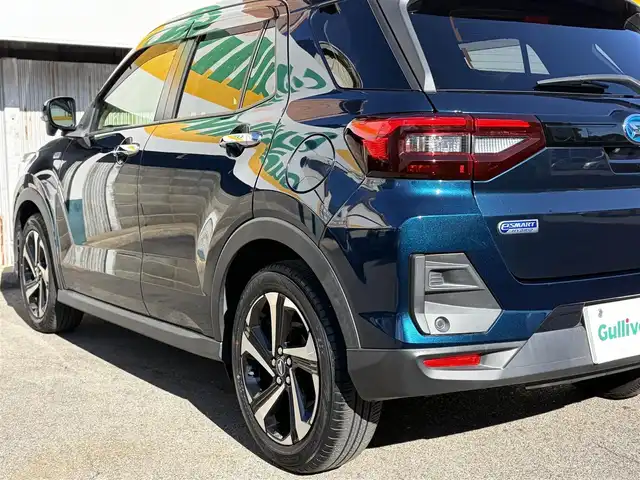 ダイハツ ロッキー プレミアム G HEV 三重県 2021(令3)年 2.6万km レーザーブルークリスタルシャイン 走行距離25540ｋｍ/スマートアシスト/　・衝突警報機能（対車両・対歩行者）/　・衝突回避支援ブレーキ機能（対車両・対歩行者）/　・ブレーキ制御付誤発進抑制機能（前方・後方）/　・車線逸脱警報機能/　・車線逸脱抑制制御機能/　・路側逸脱警報機能/　・全車速追従機能付ＡＣＣ/純正９型ナビ/　・Bluetooth/　・フルセグＴＶ/　・ＤＶＤ再生/　・ＣＤ録音/　・ＵＳＢ/全方位モニター/スマートキーｘ２/プッシュスタート/ドライブレコーダー（ナビ連動）/クリアランスソナー/ハーフレザーシート/前席シートヒーター/革巻きステアリング/ステアリングスイッチ/ＬＥＤヘッドライト/ＬＥＤフォグライト/リアフォグライト/オートライト/オートリトラクタブルミラー/ウィンカーミラー/ビルトインETC/フロアマット/プライバシーガラス/ドアバイザー/横滑り防止機能/サイド/カーテンエアバック