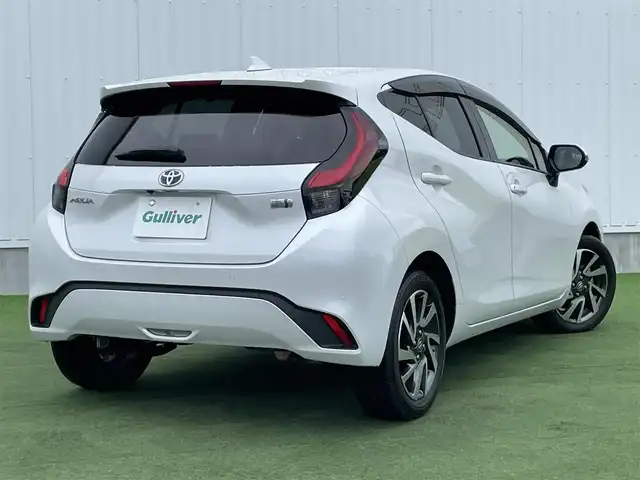 トヨタ アクア Z 香川県 2021(令3)年 3.3万km プラチナホワイトパールマイカ 登録時走行距離：32374km/メーカー純正10.5型ナビ/バックカメラ/ビルトインETC/プリクラッシュセーフティシステム/レーダークルーズコントロール　/前後コーナーセンサー/ＬＥＤオートライト/オートハイビーム　/フォグランプ　/ＡＣ１００Ｖ充電　/電格ウィンカーミラー　/純正16インチアルミホイール/プッシュスタート/スマートキー/ステアリングリモコン　/革巻きステアリング　