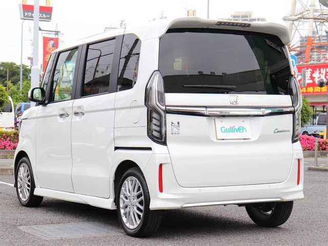 ホンダ Ｎ ＢＯＸ カスタム L ターボ 神奈川県 2023(令5)年 1万km プラチナホワイトパール ホンダセンシング（安全運転支援システム）/両側パワースライドドア/LEDヘッドランプ/：オートヘッドライト/：LEDフロントフォグランプ/純正15インチアルミホイール/ハーフシェイドフロントウィンドウ/：ロールサンシェード/パドルシフト/シートヒーター（前席）/ーーーーーーーーーーーーーーーーーーーーーーー/保証書/取扱説明書/ナビ取説/スペアスマートキー×1本