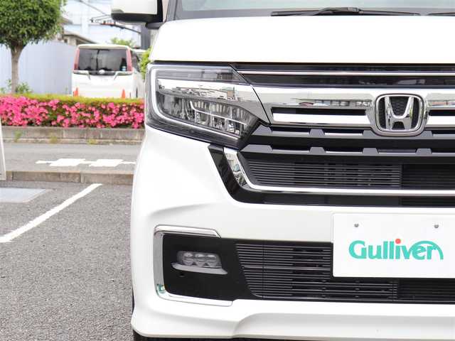ホンダ Ｎ ＢＯＸ カスタム L ターボ 神奈川県 2023(令5)年 1万km プラチナホワイトパール ホンダセンシング（安全運転支援システム）/両側パワースライドドア/LEDヘッドランプ/：オートヘッドライト/：LEDフロントフォグランプ/純正15インチアルミホイール/ハーフシェイドフロントウィンドウ/：ロールサンシェード/パドルシフト/シートヒーター（前席）/ーーーーーーーーーーーーーーーーーーーーーーー/保証書/取扱説明書/ナビ取説/スペアスマートキー×1本