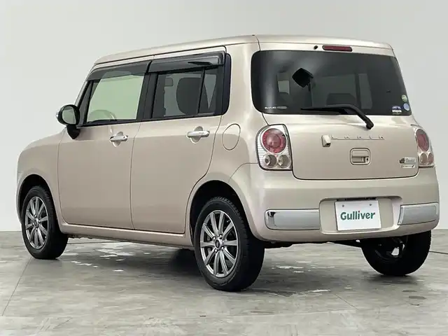 スズキ ラパン ショコラ X 群馬県 2014(平26)年 7.5万km シャンパンピンクPM 社外ディスプレイオーディオ　ＨＩＤライト　オートライト　ラパンショコラ専用シート　社外１４インチアルミホイール　純正フロアマット　ＥＴＣ　スマートキー　オートエアコン　横滑り防止装置　禁煙車