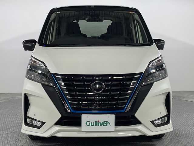 日産 セレナ e－パワー ハイウェイスター V 広島県 2021(令3)年 2.7万km ブリリアントホワイトパール 2トーン 純正１０型ナビ/純正後席フリップダウンモニター/アラウンドビューモニター/インテリジェントルームミラー/ブラインドスポットモニター/プロパイロット/ドラレコ/ＥＴＣ/オートマチックハイビーム/LEDヘッドライト/フォグランプ/レーンキープ/衝突軽減/踏み間違い防止/純正16インチアルミホイール(195/60/R16)/エアバッグ(運転席/助手席/サイド/カーテン)